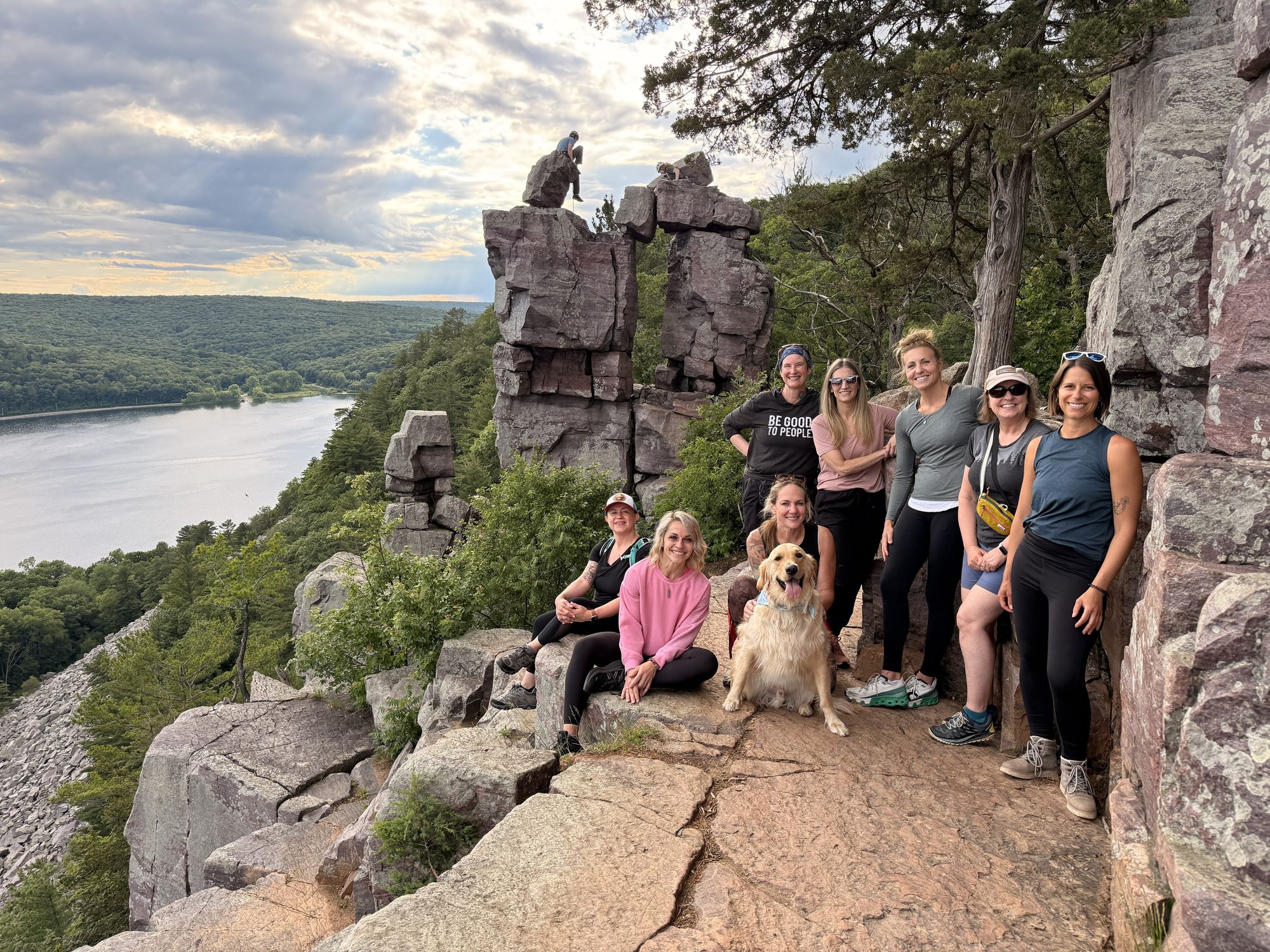 A group of women together on the bluffs above Devil's Lake
