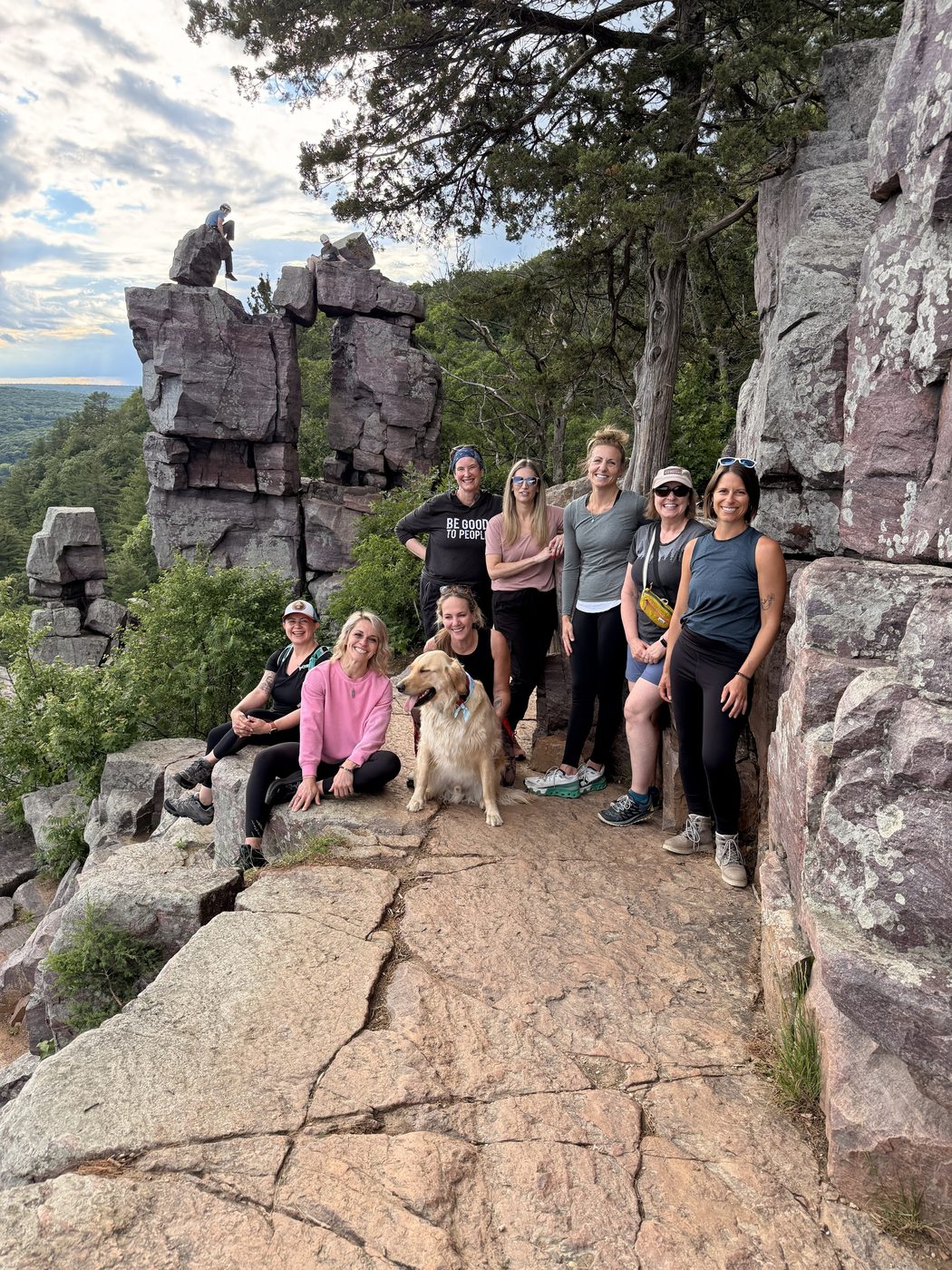 The group gathered on the rocks above the lake